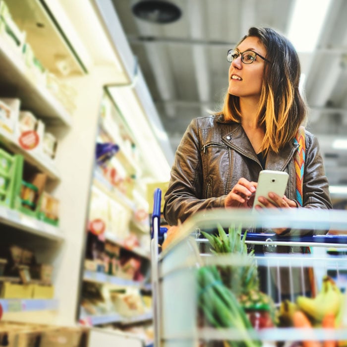 woman-browsing-in-grocery-store